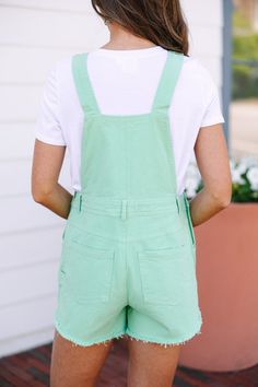 Who doesn't love a pair of cute overall for the summer! These in particular are truly adorable! We love their coloring and those causal raw hems. These overalls features pockets, raw hems, and a classic fit.
Material has a fair amount of stretch.Sydney is wearing the small. Green Dungarees Outfit, Green Dungarees, Dungarees Outfit, Dungaree Outfit, Mint Julep Boutique, Mint Julep, Model Fits, Denim Overalls, Personal Marketing