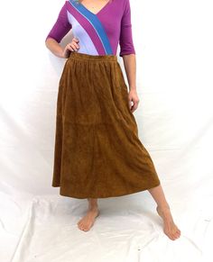 "Cute skirt. Love the pocket details By Resi Hammerer  Size 40 Made in Austria Great vintage shape - mark on waist interior - see photo of tag Large Suede, lined Elastic waist Lying flat.. Top to bottom: 33\" Hips free 14\" across at waist" Maxi Rock, 15% Off Sale, Cute Skirt, Cute Skirts, Flats Top, Pocket Detail, Brown Suede, Clothing Items, Maxi Skirt