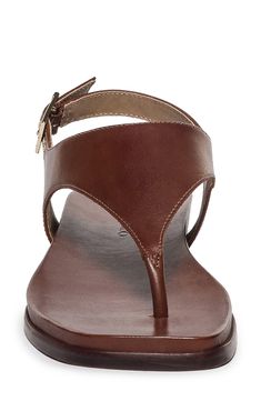 A rich leather upper lends timeless appeal to a summer-ready sandal secured with a center toe post and adjustable slingback strap. Adjustable slingback strap with buckle closure Leather upper and lining/synthetic sole Made in Brazil Brown Ankle Strap T-strap Sandals With Leather Footbed, Chic T-strap Sandals With Toe Post And Buckle Closure, Brown Leather T-strap Sandals, Elegant Adjustable T-strap Sandals With Buckle Closure, Adjustable Slingback Sandals With Leather Footbed, Elegant Sandals With Leather Footbed And Single Toe Strap, Brown T-strap Sandals With Heel Strap And Open Toe, Chic Sandals With Buckle Closure And Toe Post, Leather T-strap Sandals With Leather Lining