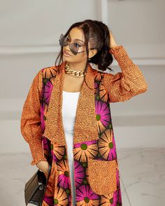 The African Print Dafi Kimono is the perfect COMBO of two prints designed to be a statement piece for your closet! It features a multicolour abstract design and is 61” in length, forming a flawless silhouette. Pair it with your favourite blue jeans and heels for a sexy day or night out on the town! FEATURES Material is 100% African print cotton Kimono/Jacket is lined. Kimono has pockets Model is 5'7 and wore a S Disclaimer: Ace Kouture is committed to bringing you 100% REAL & Authentic African F Boubou Styles, Kimono Styles, Short Kimono Jacket, Cotton Kimono, Short Kimono, Kimono Jacket, African Print, African Fashion, Abstract Design