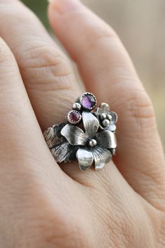 ITEM DESCRIPTION: I can make it any size you want - just mark your size in the order Weight - 4 g I made this viola flower ring from 925 silver, amethyst, and pink sapphire. But you can order it with different stones. This ring is amazing! The tiny flowers and leaves look romantic and delicate on your fingers. This is a real treasure for an elven princess. More viola jewelry in my shop https://www.etsy.com/shop/UrsulaJewelry?ref=seller-platform-mcnav&search_query=viola Nature-inspired Flower Wedding Rings, Delicate Sterling Silver Flower Ring For Wedding, Sterling Silver Flower Ring For Wedding, Silver Flower Ring For Promise, Silver Promise Flower Ring, Unique 3d Flower Jewelry, Unique 3d Flower Shaped Jewelry, Delicate Sterling Silver Jewelry With 3d Flowers, Delicate Sterling Silver Promise Flower Ring