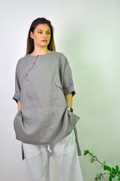 Linen shirt for Women, Gray Linen Shirt, Linen Clothing, Linen Fabric, Long Cardigans Womens, Linen Plus Size Clothing, Ladies Linen Tops 🤍Summer 100% linen shirt. Asymmetrical long loose shirt. Amazing asymmetric  top. ORGANIC oversize tunic, shirt. This high-low shirt is made out of 100% linen fabric.  This loose and comfortable stylish shirt for women is adding elegant and fashion touch in your everyday life. Perfect solution for your everyday outfit. Color: Gray Model on the picture is wear Relaxed Fit Half-sleeve Tops With Buttons, Relaxed Fit Half Sleeve Top With Buttons, Gray Summer Tops With Pockets, Summer Gray Tops With Pockets, Oversized Crew Neck Top With Buttons, Relaxed Fit Tunic Tops For Daywear, Relaxed Fit Tunic Top With Buttons, Gray Relaxed Fit Button-up Top, Gray Summer Tops For Daywear