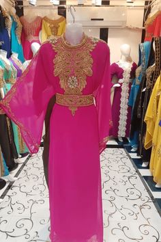 This elegant kaftan wedding dress, made from high-quality georgette fabric, features intricate hand beaded detailing. It is stitched for a perfect fit and designed to make you look stunning on your special day. The exquisite craftsmanship and luxurious design make it an ideal choice for weddings. Kaftan Wedding Dress, Kaftan Wedding, Beaded Work, Luxurious Design, Georgette Fabric, African Attire, Hand Beading, Hand Embroidered, Bead Work