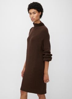 The Grace Merino Sweater Dress is a wardrobe essential for effortless seasonal dressing. With a relaxed yet sophisticated silhouette, it features thoughtful design details like dropped shoulders and a mock neck. Made from 100% Merino wool, it naturally insulates, breathes, and regulates temperature. This cool-weather staple is designed to wear on repeat, so you can feel comfortable and look chic more often. Kit And Ace, Merino Sweater, Shirt Pant Set, Mens Flannel, The Grace, On Repeat, Look Chic, Long Sweaters, Flannel Shirt