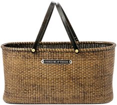 a woven shopping basket with two handles