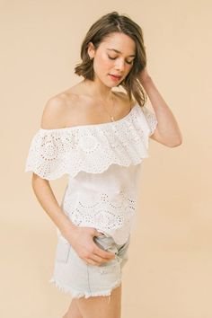 This White Eyelet Off Shoulder Top is the ultimate summer blouse that goes with just about anything! Pair this white eyelet blouse with Bella Chic Fashion jeans, shorts, or skirts. Product Description: A woven eyelet top featuring off the shoulder neckline with flounce, and relaxed body Details Self :100% Exclusive of decoration Size & Fit - Model is 5'8" And Wearing Size Small - Measurements Taken From Size Small - Approx. Length: 16.5" White Eyelet Blouse, Body Details, Lead By Example, Eyelet Blouse, Summer Blouse, Eyelet Top, Fashion Jeans, Off Shoulder Top, Summer Blouses