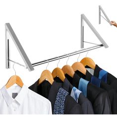 a person is pointing at clothes on hangers in front of a white background with an image of a man's shirt and tie