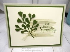 a handmade card with green leaves and the words, with deepest sympathy on it