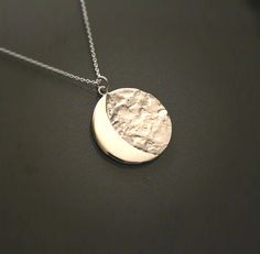 A moon quarter pendant from solid sterling silver hand carved using the lost wax method. width: 26mm / 1.02inch comes on a 18 inch/ 45cm long black sterling silver chain.If you would like a 20 inch / 50cm long chain. >>I ship worldwide. All items are send through the greek postal system by a priority registered mail. I will send you a tracking number to keep track of your purchase. >>All items will be send in a gift box inside safe packaging. ♥ Shopping on Etsy is really easy ♥ : htt Sterling Silver Moon-shaped Jewelry For Anniversary, Silver Necklace With Moon Charm, Nickel Free Sterling Silver Crescent Necklace, Sterling Silver Moon Charm Necklace For Anniversary, Silver Half Moon Jewelry Engraved, Sterling Silver Necklaces With Moon Charm For Anniversary, Silver Half Moon Engraved Jewelry, Sterling Silver Necklace With Moon Charm For Anniversary, Sterling Silver Necklace With Moon Charm For Anniversaries