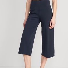 Old Navy Extra High Waisted Power Lite Lycra Adaptiv Hybid Cropped Pants Workwear Capri-length Pull-on Bottoms, Versatile Capri Length Bottoms For Workwear, Versatile Wide-leg Capris, Versatile Mid-rise Blue Bottoms, Versatile Mid-rise Blue Pants, Versatile Capri-length Bottoms With Pockets, Blue Capri Length Bottoms For Work, Blue Capri-length Bottoms For Work, Versatile Capri Length Bottoms With Elastic Waistband