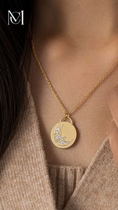 The Skyward Necklace was carefully handcrafted from solid 14k gold and depicts a crescent sweep made of ten round diamonds and three oval diamonds. ﻿The gold pendant is 19.5mm in diameter, 2mm thick and is available on its own or with a 20" rope chain that matches your choice of gold color: yellow, white, or rose. Find more images at melaniecasey.com. Elegant Crescent Rose Cut Diamond Jewelry, Fine Jewelry Diamond Moon Phase, Crescent Rose Cut Diamond Jewelry Gift, Crescent Shaped Rose Cut Diamond Jewelry Gift, Yellow Gold Celestial Jewelry With Single Cut Diamonds, Celestial Moon Shaped Jewelry With Rose Cut Diamonds, Celestial Moon-shaped Jewelry With Rose Cut Diamonds, Crescent Yellow Gold Jewelry With Rose Cut Diamonds, Elegant Diamond Moon Phase Jewelry