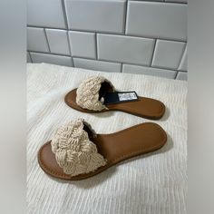 Brand: Universal Thread Color: Tan Size: 6 Never Used New With Tags Trendy Open Toe Sandals With Woven Sole, Synthetic Flip Flops With Textured Footbed For Summer, Casual Beige Flat Flip Flops, Beige Flat Synthetic Flip Flops, Trendy Adjustable Sandals With Woven Sole, Trendy Sandals With Woven Sole And Adjustable Fit, Casual Beige Flip Flops With Textured Footbed, Trendy Beige Flip Flops For Vacation, Casual Synthetic Flip Flops With Woven Sole