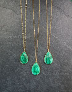 Malachite gemstone with rich green color on a custom length 14k Gold Filled chain. Customize your necklace in your choice of cable, link or satellite chain.  The back of the pendant is like the front but with a different natural pattern and design.  Malachite clears and activates all Chakras, and is especially helpful in the stimulation of the Heart and Throat Chakras. An extremely powerful metaphysical stone, Malachite is often called the "stone of transformation" and is used for deep energy cleaning, bringing healing and positive transformation to the wearer. Your necklace will arrive in a beautiful gift box and gift bag.  Stone: Malachite Shape: Teardrop, Multifaceted finish   Size:  7/8" inch wide, 1 3/8" inch height       Chain: 14k Gold Filled Length: custom length Clasp: secure lobs Spiritual Green Jewelry With Adjustable Chain, Elegant Green Chrysocolla Jewelry, Green Gemstone Teardrop Pendant Necklace, Green Teardrop Pendant Necklace With Gemstone, Green Chrysocolla Pendant Jewelry, Green Chrysocolla Gemstone Jewelry, Green Malachite Gemstone Bead Necklaces, Green Malachite Gemstone Bead Jewelry, Green Malachite Jewelry With Gemstone Beads