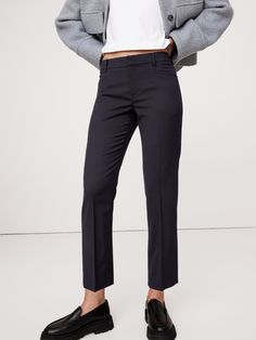 A tailored piece of performance, this soft and luxurious pant is crafted from responsible Italian wool that moves with ease.  A sleek and modern fit for the office or date night.  Stretch, Breathable, Wrinkle-Resistant.  Mid-rise.  Slim leg.  Ankle length.  Fabric from Italy's Marzotto Mill.  Zip fly with button closure.  Four-pocket styling.  Flat front.  Trouser crease.  Unlined.  *This style runs large.  Consider sizing down.  Slim-Straight Fit: Mid-rise (8").  Straight throughthe hip and thi Petite Shorts, Slim Leg, Ankle Pants, Slim Legs, Petite Size, Siena, Modern Fit, Ankle Length, Date Night