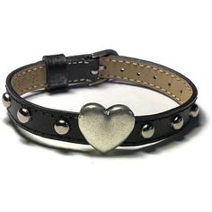 Love hearts?   You'll love this bracelet!  It has a Tibetan Chrome color Slide Charm Heart with round studs evenly spaced across the center of a genuine black leather buckle bracelet wristband strap. This black leather buckle wristband bracelet strap is 10mm wide and about 8 inches long.   It can fit a wrist from 5.5"  to 7.5" around.  The strap is made of Genuine leather material and are stamped as such on the back. They are sewn around the edges for more durability. The band is adjustable and Adjustable Metal Bracelets For Valentine's Day, Adjustable Metal Bracelet For Valentine's Day, Adjustable Nickel-free Heart Bracelet For Everyday, Adjustable Nickel-free Bracelet For Valentine's Day, Adjustable Metal Heart Bracelet For Friendship, Adjustable Metal Heart Bracelet For Valentine's Day, Adjustable Metal Heart Charm Bracelet, Adjustable Heart-shaped Metal Bracelets, Fire Clothes