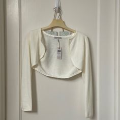 Nwt John Lewis Cream Cardigan. Never Worn. Cute Fitted Summer Outerwear, Spring Cotton Fitted Shrug, Spring Fitted Cotton Shrug, Fitted Cotton Spring Shrug, Fitted Cotton Shrug For Spring, White Fitted Casual Shrug, White Long Sleeve Shrug For Spring, Long Sleeve Under Shirt, Unicorn Sweater