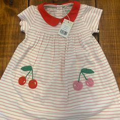 Baby Boden Nwt 2-3y Cherry Dress Sweet Red Short Sleeve Dress, Playful Cotton Dress For Holiday, Playful Cotton Holiday Dress, White Cotton Holiday Dress, Cute Red Dress For Play, Playful Red Dresses For Play, Red Cotton Dress For Play, Red Cotton Casual Dress, Red Summer Dress For Playtime