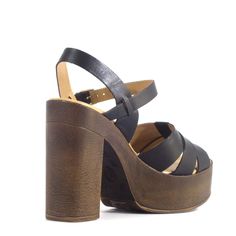 Designed in luxe leather with a dramatic platform and chunky heel, Chelsea Crew's HOLLIE sandals deliver maximum impact to any ensemble. Wear them to balance the season's fluid hemlines and cropped pants. Upper: leather Closure: buckle Heel height: 4.5" Platform height: 2.5" Mask Necklace, Buckled Heels, Slipper Boots, Chunky Heel, Platform Heels, Bag Straps, Chunky Heels, Black Sandals, Handbag Accessories