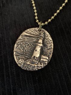 "Lighthouse Pendant Necklace!  An Original Designed Unique Pendant! Size is 1-1/8\" wide by 1-3/8\" tall  Pendant Cast in Solid Bronze 24\" Ball Chain Necklace Price includes USPS First Class Shipping Hand Made in the USA! If you need a gift box or priority mail shipping, please contact us for an upgrade." Bronze Jewelry With Lobster Clasp For Gift, Stamped Metal Necklaces For Gifts, Gold Nickel-free Dog Tag Necklace, Gold Dog Tag Necklace Nickel Free, Adjustable Nickel Free Dog Tag Necklace, Gold Nickel-free Dog Tag Necklaces, Bronze Nickel-free Necklace Gift, Nickel-free Bronze Necklace For Gift, Gift Nickel-free Bronze Necklace