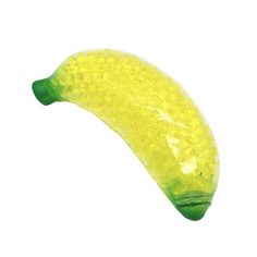 a green and yellow banana sitting on top of a white surface with lots of bubbles