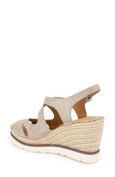 Groovy cutout straps kiss at the toe of this cabana-ready sandal set atop plush PORON® cushioning and a woven wedge. 3 1/2" heel; 1 1/4" platform Adjustable ankle strap with buckle closure Multilayered, PORON-cushioned footbed with arch support Leather upper and lining/rubber sole Imported Spring Beach Wedge Heel T-strap Sandals, Spring Beach T-strap Sandals With Wedge Heel, Closed Toe Wedge Sandals With Arch Support For Vacation, Summer T-strap Sandals With Removable Insole And Wedge Heel, Summer T-strap Wedge Sandals With Removable Insole, Beige Adjustable Ankle Strap Wedge Sandals, Beach Wedge Heel Sandals With Heel Strap, Wedge Heel Sandals With Heel Strap For Beach, Beach Closed Toe Wedge Sandals With Heel Loop