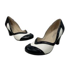 Chelsea Crew's Vintage Emma Black White Heels, Size 37, Are The Perfect Blend Of Style And Comfort. These Leather Mid Heels Feature A Round Toe And Come New Without Box.. Brand: Chelsea Crew Color: Black White Size: 37 Style: Emma Heels For: Women Material: Leather Retro Heels With Contrasting Heel Counter And Round Toe, Retro White Block Heel Heels, Vintage Heels With Contrasting Heel Counter, Retro White 4-inch Heels, Retro Heels With Rubber Heel Cap, Retro Heels With Contrasting Block Heel, Retro Pointed Toe Heels With Reinforced Heel, Retro Court Shoes With 4-inch Heel In Medium Width, Retro Court Shoes With 4-inch Heel Medium Width