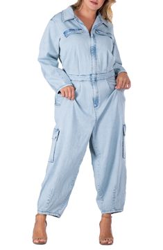 Update your casual-cool vibe in this light-wash denim jumpsuit designed with cargo pockets. 53" length; 26" inseam Spread collar Long sleeves 74% cotton, 24% polyester, 2% spandex Machine wash, tumble dry Imported