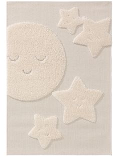 a white rug with stars on it