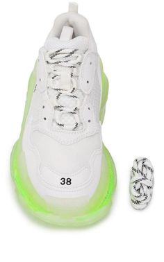 Balenciaga's white Triple S trainers are an avant-garde reworking of one of the label's cult styles. They're crafted from mesh and leather panels with an embroidered logo at the side, then set on a chunky fluorescent rubber sole.White/neon yellow Logo print to the sideRound toeFront lace-up fasteningPull-tab at the heel Chunky rubber soleComposition: Leather, mesh and leather panelsSole: Rubber 100%Lining: Fabric 100% Balenciaga Triple S Sneakers, Chevron Outfit, Chevron Jewelry, White Balenciaga, Yellow Logo, Gucci Shop, Mesh Sneakers, Shoes Flats Sandals, Luxury Women Fashion