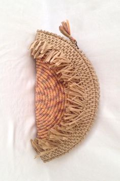 Beige Bohemian Straw Bag With Tassels, Bohemian Beige Straw Bag With Tassels, Bohemian Beach Straw Pouch Bag, Bohemian Straw Bag With Fringe, Bohemian Natural Straw Bag With Fringe, Bohemian Woven Straw Pouch Bag, Bohemian Rectangular Clutch With Fringe, Bohemian Fringe Rectangular Clutch, Bohemian Rectangular Fringe Clutch