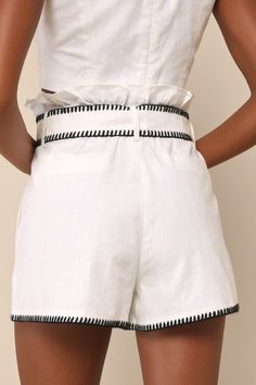 Your style is certain to get compliments in the Delightful Summer White and Black Embroidered Belted Shorts! Lightweight, linen-cotton blend fabric shapes these cute shorts that have a high waist (with ruffled trim) a hidden zip fly with top clasp closures, belt loops, and a wide belt with an O-ring detail at front. Oversized porkchop pockets accent the front, with decorative welt pockets at the back. Contrasting black embroidery accents the hems and edges, for a unique effect! Fit: This garment fits true to size. Length: Above mid-thigh. Waist: Fitted - very fitted at natural waist. Hip: Loosely Fitted. Fabric: Fabric has no stretch. Lined. Self: 55% Linen, 45% Cotton. Lining: 100% Cotton. Hand Wash Cold. Do Not Bleach. Line Dry. Iron Low Heat. Imported. Lulus | Delightful Summer White an Black Embroidery, Swimming Outfit, Summer White, Belted Shorts, Wide Belt, Cute Shorts, White Summer, Natural Fabrics, O Ring