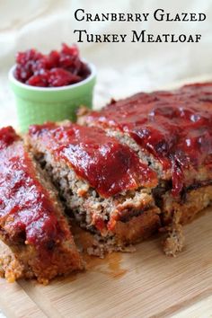 cranberry glazed turkey meatloaf on a cutting board