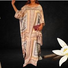 Make a statement as you appear at the scene looking classy in this elegant-looking Caramel Italian Silk African Kaftan Bubu Style. The rich and beautiful colours in this stunning silk fabric flow gracefully, making this maxi outfit a perfect and comfortable attire suitable for a day or evening occasion. Soft on the skin, this fashionable African Bubu outfit is an ideal vacation staple. This beautiful and lightweight boubou is made from a breathable and soft blend of Italian silk with a dash of African Satin giving it a shimmering effect. This outfit is versatile and therefore suitable for many occasions. The loose fitting makes it a great compliment for all body shapes and heights. Hangs loosely on the body with slits on both sides for comfortable manoeuvring. * Made of breathable fabric f Chic Floor-length Kaftan For Vacation, Elegant Beach Maxi Dress For Eid, Elegant Maxi Dress For Beach And Eid, Long Beige Dress For Eid, Long Beige Dresses For Eid, Beige Long Dress For Eid, Elegant Long Brown Abaya, Elegant Silk Long Kaftan, Elegant Silk Long Kaftan Dress