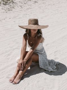 A handmade wide-brim straw hat featuring a woven trim, a perfect sunny-weather staple. Perfect to keep your face shaded on sunny days in a floppy beach hat that goes with any outfit ideal for beach trips. Can also be used as wall decor to add some character to any space. *Sizes vary, but measure about S/M: 21 IN M/L: 23 IN Model: @summerofdiane wearing a S/M ***Each individual piece is handmade with love and has unique imperfections. *Please note our hats are not exchangeable. We only provide re Unique Birthday Dresses, Poses With Hat, Sunhat Outfit, Birthday Dresses Ideas, Beach Hats For Women, Trending 2023, Floppy Beach Hat, Wide Brim Straw Hat, 2023 Design