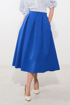 A solid woven full skirt with side zipper closureDetails:Self : 100% PolyesterSize & Fit- Model is 5`9" And Wearing Size Small- Measurements Taken From Size Small- Approx. Length: 35" Blue Relaxed Skirt With Solid Color, Blue Solid Color Skirt, Blue A-line Bottoms With Pockets, Blue Pleated Waist Bottoms For Work, Blue Gathered Midi Skirt, Blue Pleated Waist Skirt For Work, Blue Midi Length Pleated Skirt For Summer, Blue Midi Skirt With Gathered Details, Blue Midi Length Pleated Skirt For Workwear