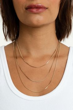 Add a charm or wear it on its own—the Bowie Chain is perfect for both layering and wearing solo. Its versatile design makes it an essential piece for any jewelry collection, effortlessly transitioning from a subtle accent to a standout statement. 18k gold-plated brass 2mm chain width Available in 3 lengths 15" - 16" 18" - 19" 21" - 22" **Does not pair with the Gianna, Harlyn, Radiant, Scarlett, or Pave Initial Charms Dainty Double Chain Everyday Jewelry, Minimalist Gold Plated Double Chain Charm Necklace, 14k Gold-filled Cable Chain Necklace For Layering, Minimalist 14k Gold Filled Charm Necklace For Layering, Minimalist Yellow Gold Jewelry With Double Chain, Minimalist 14k Gold Double Chain Jewelry, Delicate Link Jewelry For Everyday, Rose Gold Box Chain Jewelry For Everyday, 14k Gold Jewelry For Everyday Elegance