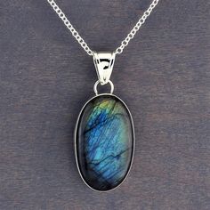 large oval labradorite pendant necklace Labradorite Necklaces, Silver Gemstone Jewelry, Labradorite Pendant, Sales Gifts, Sterling Silver Chains, Blue And Silver, Oval Shape, Handmade Silver, Silver Necklaces