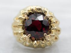 "This ring is a beautiful piece of quality craftsmanship. The yellow gold material is durable, while the garnet is a classic and elegant stone. This combination of stylishness and durability make this an ideal item for everyday wear. Metal: 18K Yellow Gold Gem: Garnet 4.29 Carats Gem Measurements: 9.3 mm, Round Ring Size: 5.25 Marks: \"CR 18K\" Stamped on the inside band SKU #: A29860 Each piece has been identified and graded by a Graduate Gemologist who has been certified by the Gemological Ins Gold Garnet Ring, Right Hand Ring, Simple Engagement Rings, Right Hand Rings, Hand Ring, Diamond Cocktail Rings, January Birthstone, Garnet Ring, Garnet Rings