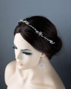 Crafted from shining starlight and exquisite antique silver, this headpiece exudes simplicity and elegance. Delicate vines adorned with shimmering crystal stars and intricate crystal beads create a stunning display of luxury. This headband measures about 15.5 inches long and 1 inch at the widest. Winter Wedding Headpiece, Diamond Headpiece, Silver Hair Accessory, Silver Headpiece, Spooky Forest, Crystal Headpiece Wedding, Stars Wedding, Silver Hair Accessories, Hair Acessories