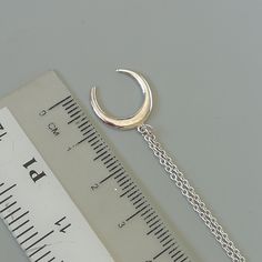 A Sterling silver neck chain with a crescent moon charm. Dimensions: 14.5 x 15.5 mm Length: 16 to 17 inches This necklace is made of 925 hypoallergenic sterling silver. Most of my pieces come with a 925 stamp. Please go through all the pictures posted for this item to gauge the actual size. Can be packaged in a gift box. I can include a personal message from you if needed You are welcome to contact me at... bhavnakwintra1956@gmail.com For more beautiful pieces from my shop, please browse 👇 SILV Celestial Pendant, Necklace Moon, Neck Chain, Moon Charm, Bohemian Earrings, Pendant Silver, Silver Pendant Necklace, Star Earrings, Bohemian Jewelry