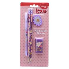 two pencils and pen in a package with flowers on the front, one has a flower