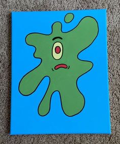 an image of a green cartoon character on a blue background with red eyes and mouth