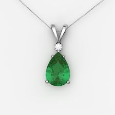 This emerald sterling silver 925 necklace presents an emerald gemstone (2.7 carats) accented by white diamond. The lab-created gemstones (including a pear-shaped May birthstone - green emerald) are set in a solid sterling silver teardrop-style pendant setting (handmade in USA). Ships in a beautiful gift box. Main Gemstone: Emerald Main Gemstone Size: 10 x 7 mm Main Gemstone Weight: ~2.7 Carats Main Gemstone Color: Green Main Gemstone Origin: Lab-Created Setting Metal: Solid 925 Sterling Silver Fine Jewelry Emerald Pear-shaped Necklace, Green Emerald Diamond Necklace For May Birthstone, Classic Green Emerald Necklace With Diamond Accents, Classic Green Diamond Pendant Necklace, Green Pendant Diamond Necklace In Classic Style, Fine Jewelry Emerald Pear Necklace, Teardrop Emerald Gemstone Necklace For Formal Occasions, Emerald Pear-shaped Necklace For Anniversary, Classic Green Pendant Diamond Necklace