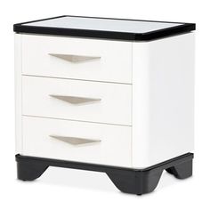 a white and black nightstand with three drawers