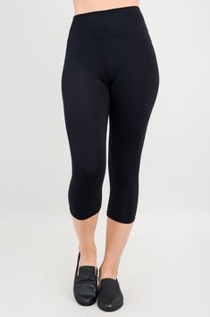 Need a basic that extends the wear and function of your wardrobe? Try the Riley Capri! Perfect for streetwear, lounge wear and workout wear, all in unparalleled comfort. A self-fabric waistband means no binding and a smooth finish up to the waist. Flat locked seams stay tight, and a gusset prevents splitting. Our natural fabric keeps you cool, with a silky touch against the skin. Wear your Riley Leggings under a dress, tunic, skirt or on their own as workout/lounge wear. Features - Self-fabric w Casual 4-way Stretch Capris For Yoga, Black Activewear With Ribbed Waistband For Workout, Comfortable Fitted Solid Activewear, Casual 4-way Stretch Capri Yoga Pants, Black Stretch Activewear With Elastic Waistband, Solid Workout Leggings With Elastic Waistband, Cotton Compression Bottoms For Loungewear, Cotton Stretch Leggings For Athleisure, Solid Color 4-way Stretch Capri Length Bottoms