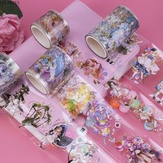 several different types of washi tapes on a pink surface