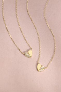 Better together. Share the love and gift one-half of this sweet set of two diamond and solid gold heart necklaces to a friend or family member. Wear this everyday keepsake as a reminder of the ones who matter most. diamond necklace; trend; spring styling; summer aesthetic; vacation; travel; new adventures; shopping; fashion; chic; streetwear; styling; styling jewelry; gift ideas; mothers day gifts; gifts for her; gifts for mom; mother's day; initial jewelry; matching jewelry; matching necklace Modern Everyday Jewelry With Single Cut Diamonds, 14k Gold Filled Diamond Cut Jewelry For Anniversary, Modern Diamond Jewelry For Everyday Wear, Everyday White Gold Jewelry With Single Cut Diamonds, Luxury Double Strand Jewelry For Anniversary, Modern Delicate Chain Jewelry For Everyday Luxury, Minimalist Stackable Diamond Jewelry, Minimalist Single Cut Diamond Jewelry For Anniversary, Modern Jewelry With Single Cut Diamonds