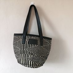 This elegant handmade sisal bag with leather straps and African print cotton inner lining with a side pocket to store small sized items has been made to serve you during all seasons. It can be used as an everyday handbag, a summer bag or even as a diaper bag. Jute Bucket Bag With Adjustable Strap For Everyday Use, Eco-friendly Shoulder Bucket Bag With Leather Handles, White Jute Bags For Daily Use, Eco-friendly Leather Handled Shoulder Bucket Bag, Eco-friendly Leather Handle Bucket Shoulder Bag, Casual Canvas Straw Bag For Everyday Use, Daily Use Basket Bucket Bag With Leather Handles, Everyday Large-capacity Basket Bucket Bag, Everyday Bucket Bag With Large Capacity