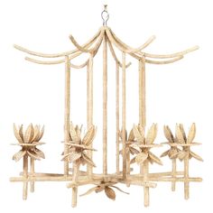 a wooden chandelier with flowers hanging from it's sides and four lights on each side