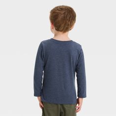 Add a splash of fun to your kid's wardrobe with this Long-Sleeve Solid T-Shirt from Cat & Jack™. Made from recycled polyester and cotton, this mid-length T-shirt is tailored in a regular fit. This tee features a crew neckline and the long-sleeve design offers a classic look. Featuring a pullover style, this T-shirt pairs well with jeans and shorts. Cat & Jack™: Designed for all children so you can trust it's made for yours. Casual Long Sleeve T-shirt For Playtime, Soft-washed Cotton Tops For Playwear, Playful Soft-washed Tops For Playtime, Soft-washed Crew Neck Tops For Playtime, Blue Soft-washed Long Sleeve T-shirt, Playful Long Sleeve Blue T-shirt, Kids Wardrobe, Thermal Shirt, Toddler Boy Outfits